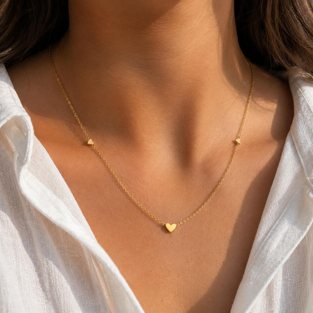 dainty hearts necklace gold plated waterproof jewellery  features 3 minimalist hearts making it deal for a 30th birthday