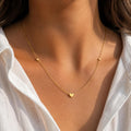 dainty hearts necklace gold plated waterproof jewellery  features 3 minimalist hearts making it deal for a 30th birthday
